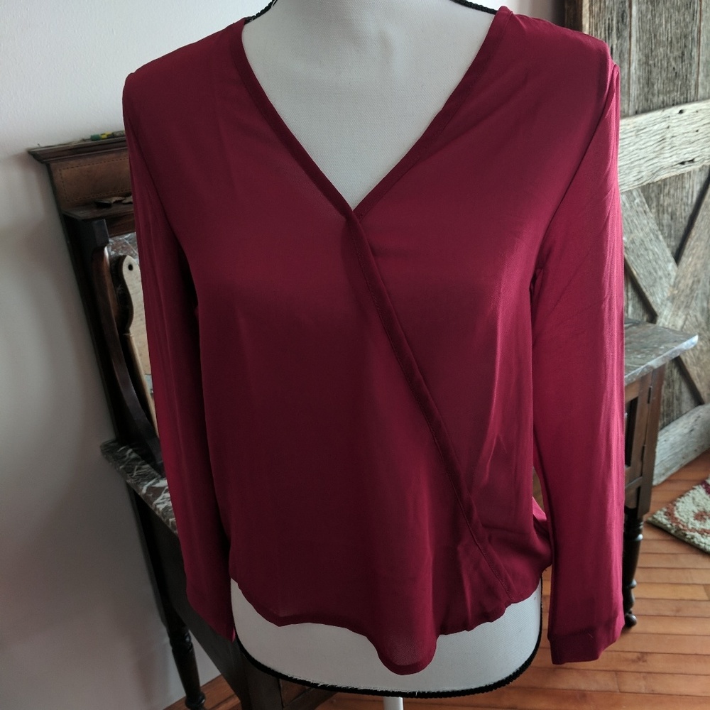 Sheer top. Size small....light top ....cranberry c